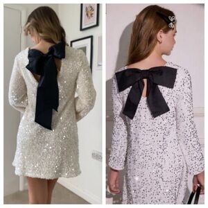 Elegant White Sequin Dress with Black Bow